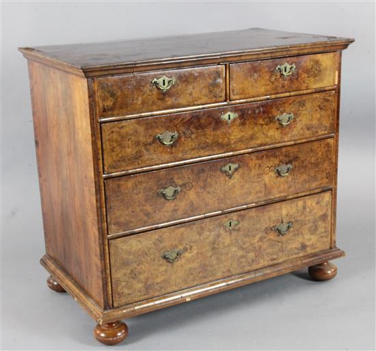 An early 18th century walnut chest, W. 3ft 2in. D.1ft8in. H.2ft11in.